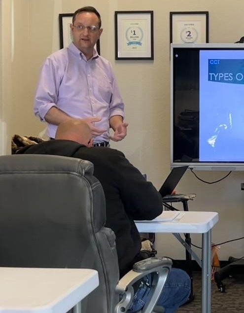 Dave Grigsby teaching a carpet dyeing class to technicians